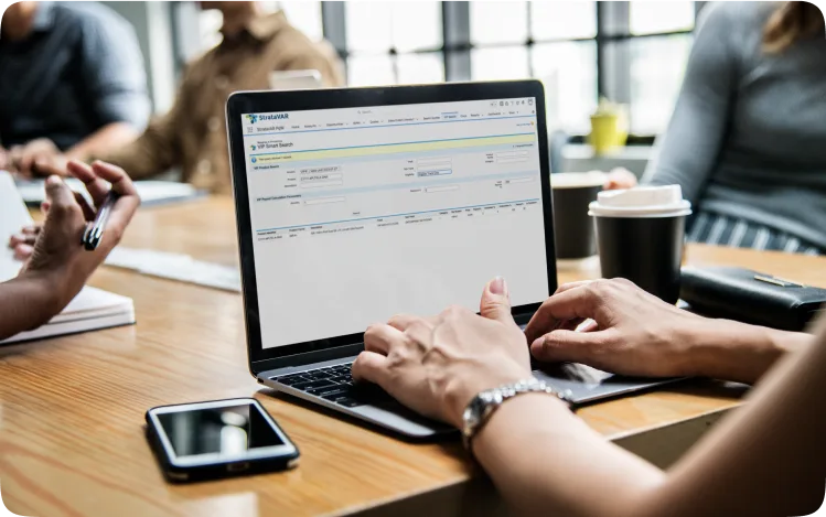 person on a laptop using Stratavar
