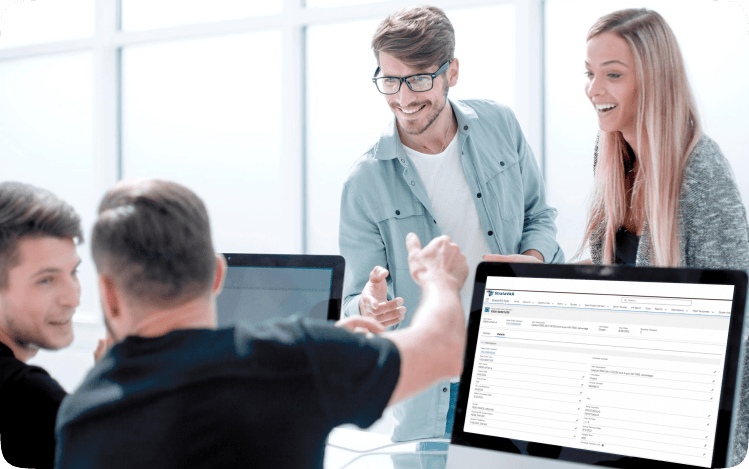 people in a meeting with computers